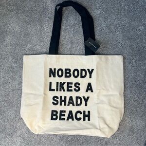 Cream Canvas Tote Bag with Black Text and Straps